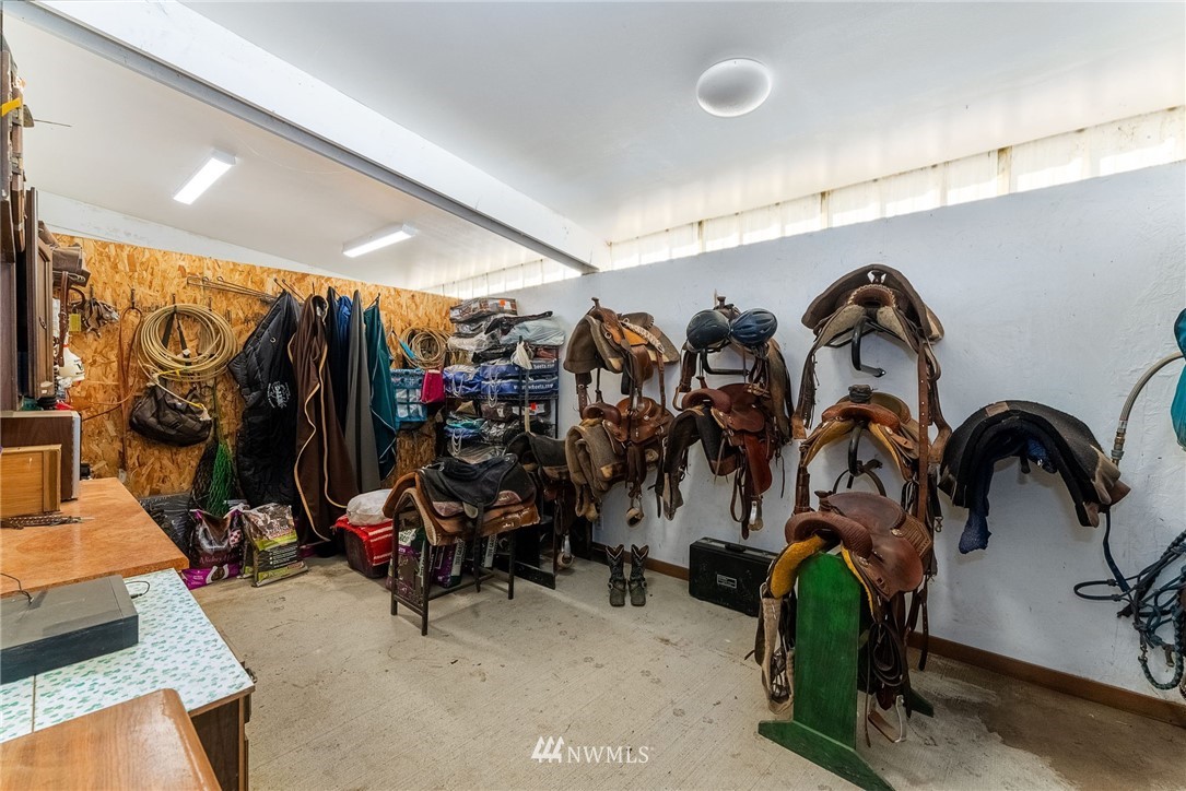 1579 Southwest J H Road Port Orchard, WA 98367 - Photo 31 of 36 a view of a room with gym equipment