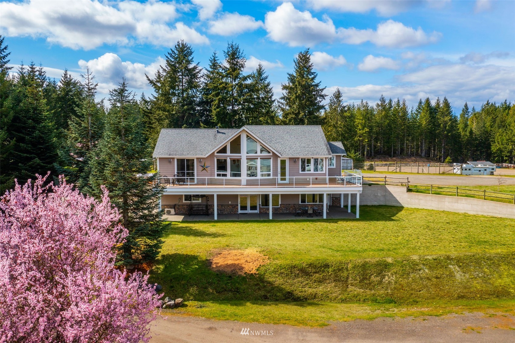 1579 Southwest J H Road Port Orchard, WA 98367 - Photo 34 of 36 a view of a house with swimming pool