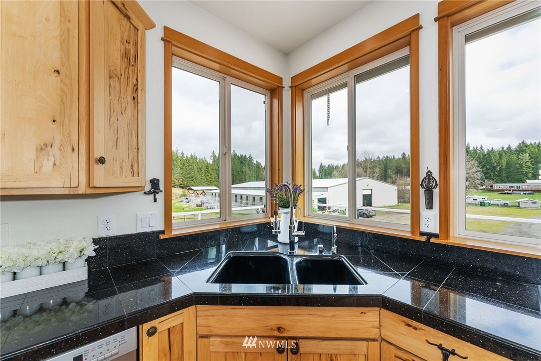 1579 Southwest J H Road Port Orchard, WA 98367 - Photo 10 of 36 a kitchen with a large window