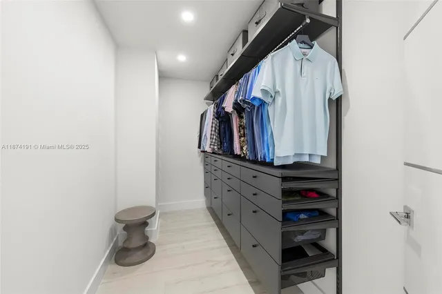 a bedroom with a bed and a table