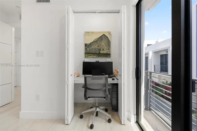 a bathroom with a double vanity sink a mirror a bathtub and shower