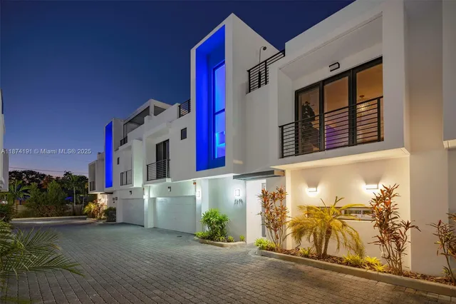 front view of a house with a street