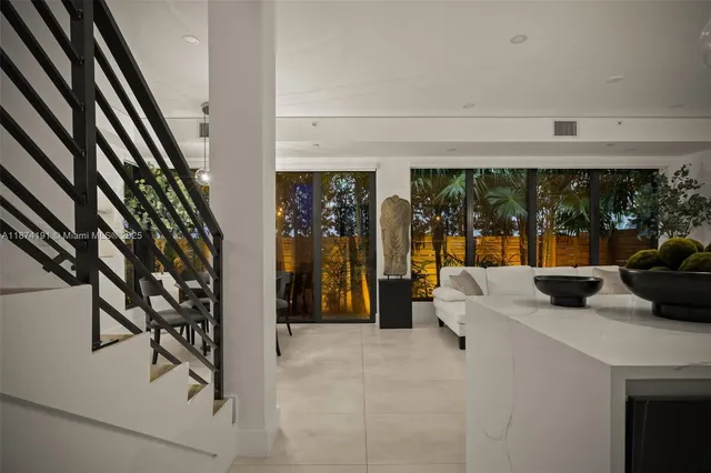 a view of living room with furniture and window