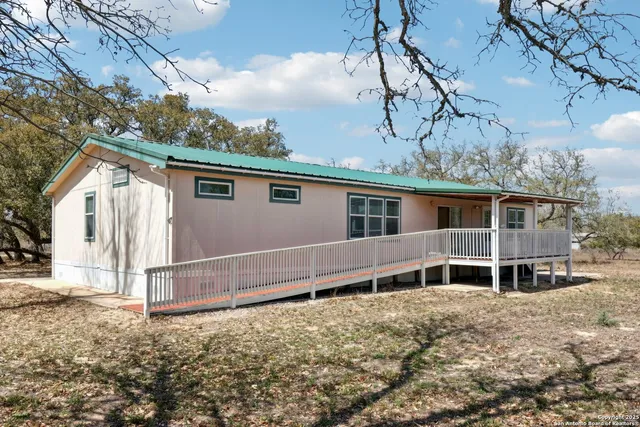 a view of a pathway both side of yard