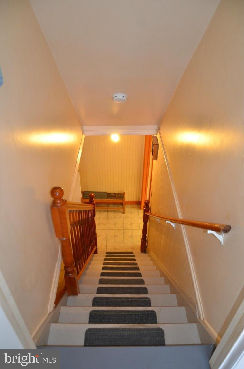 3203 Northwind Road Baltimore, MD 21234 - Photo 22 of 29 Going downstairs to your finished bmt & 4 BR/off