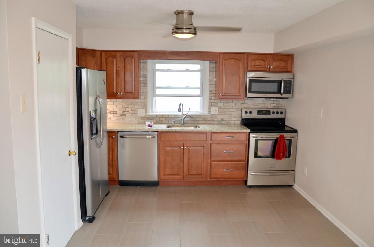 3203 Northwind Road Baltimore, MD 21234 - Photo 10 of 29 Kitchen with Stainless Steel Appliances