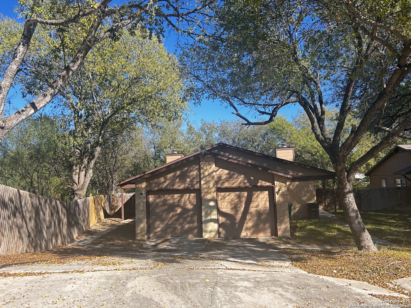 14524 Waddesdon Bluff San Antonio, TX 78233 - Photo 2 of 10 a view of a entrance gate of a house