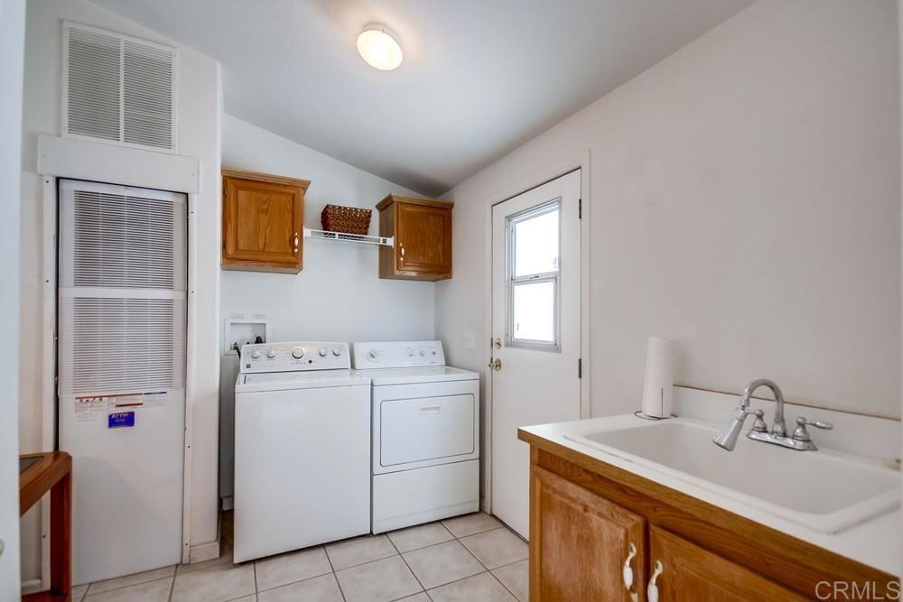 9500 Harritt Road, Unit 106 Lakeside, CA 92040 - Photo 14 of 35 a utility room with dryer and washer