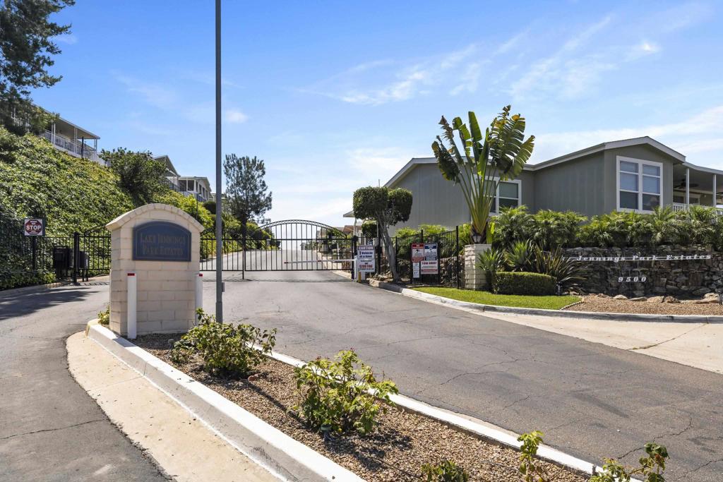 9500 Harritt Road, Unit 106 Lakeside, CA 92040 - Photo 21 of 35 a front view of a house with a yard and potted plants