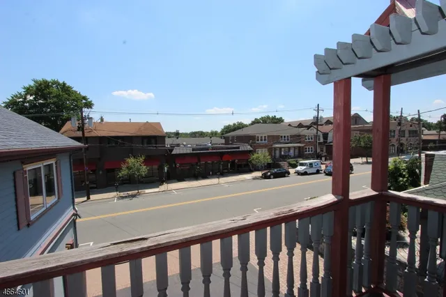 a view of a street from a balcony