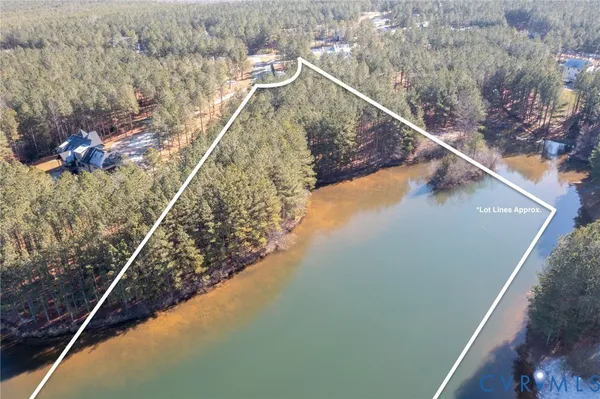 a view of lake with green space