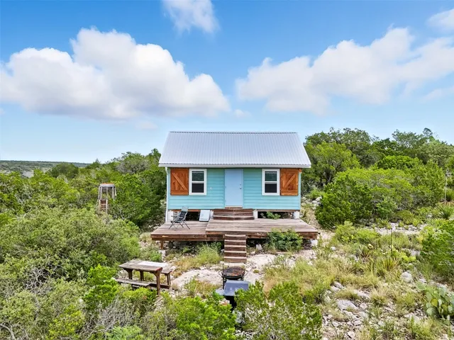 a house view with a garden space