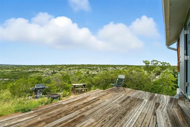 a view of a balcony with an ocean view