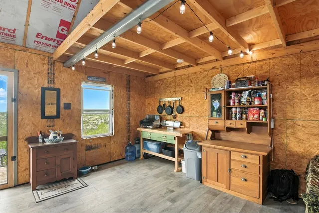 a view of a workspace with furniture