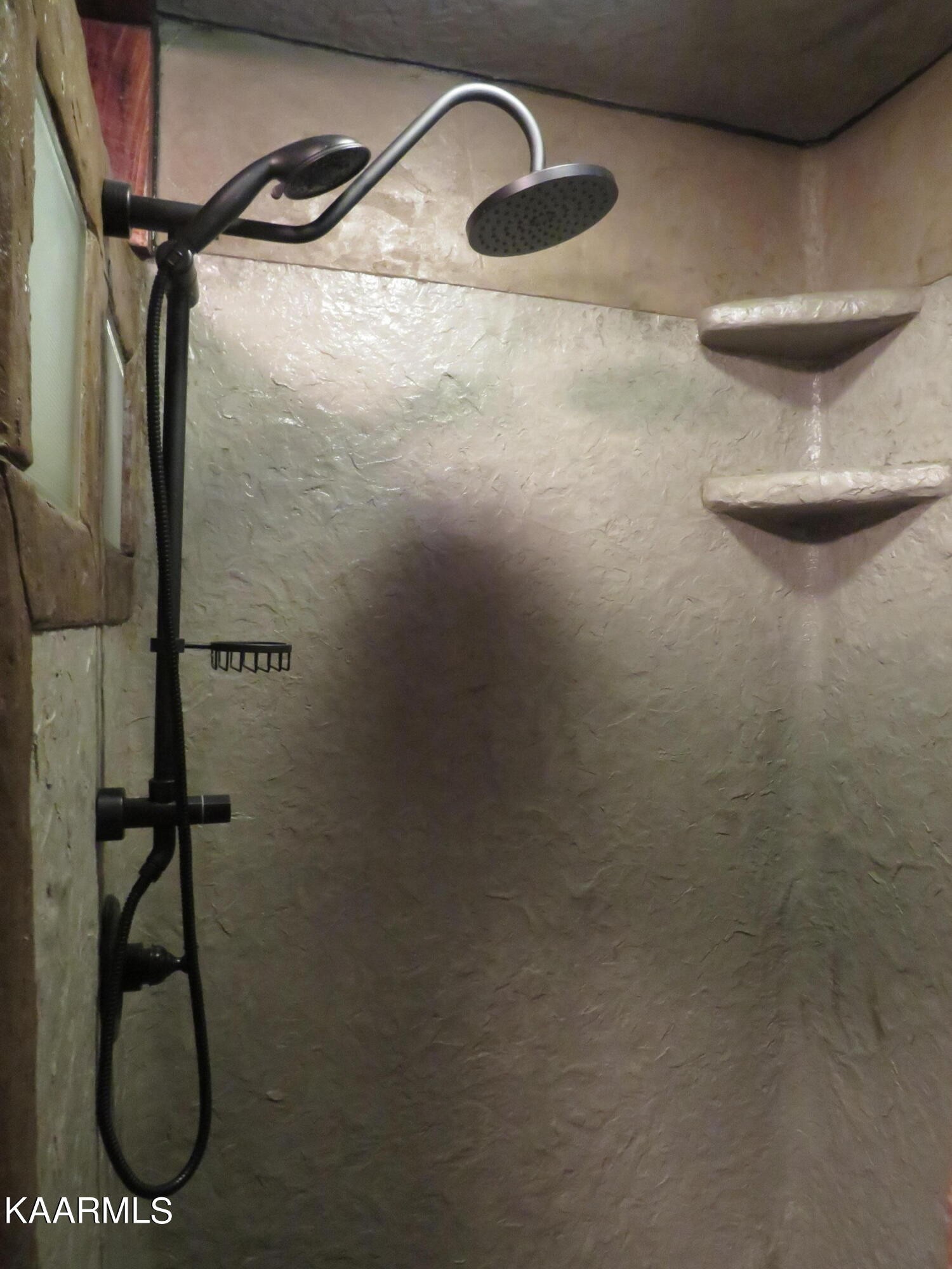 266 Ross Williams Road Lancing, TN 37770 - Photo 17 of 39 a bathroom with a shower