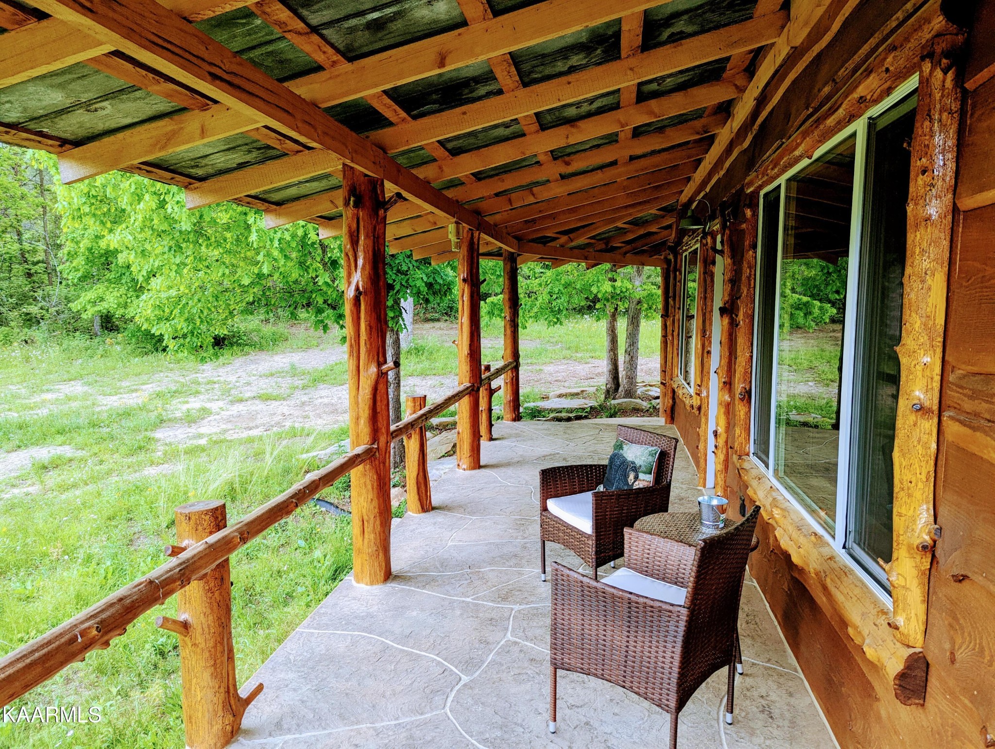 266 Ross Williams Road Lancing, TN 37770 - Photo 3 of 39 a view of chair and table in the balcony
