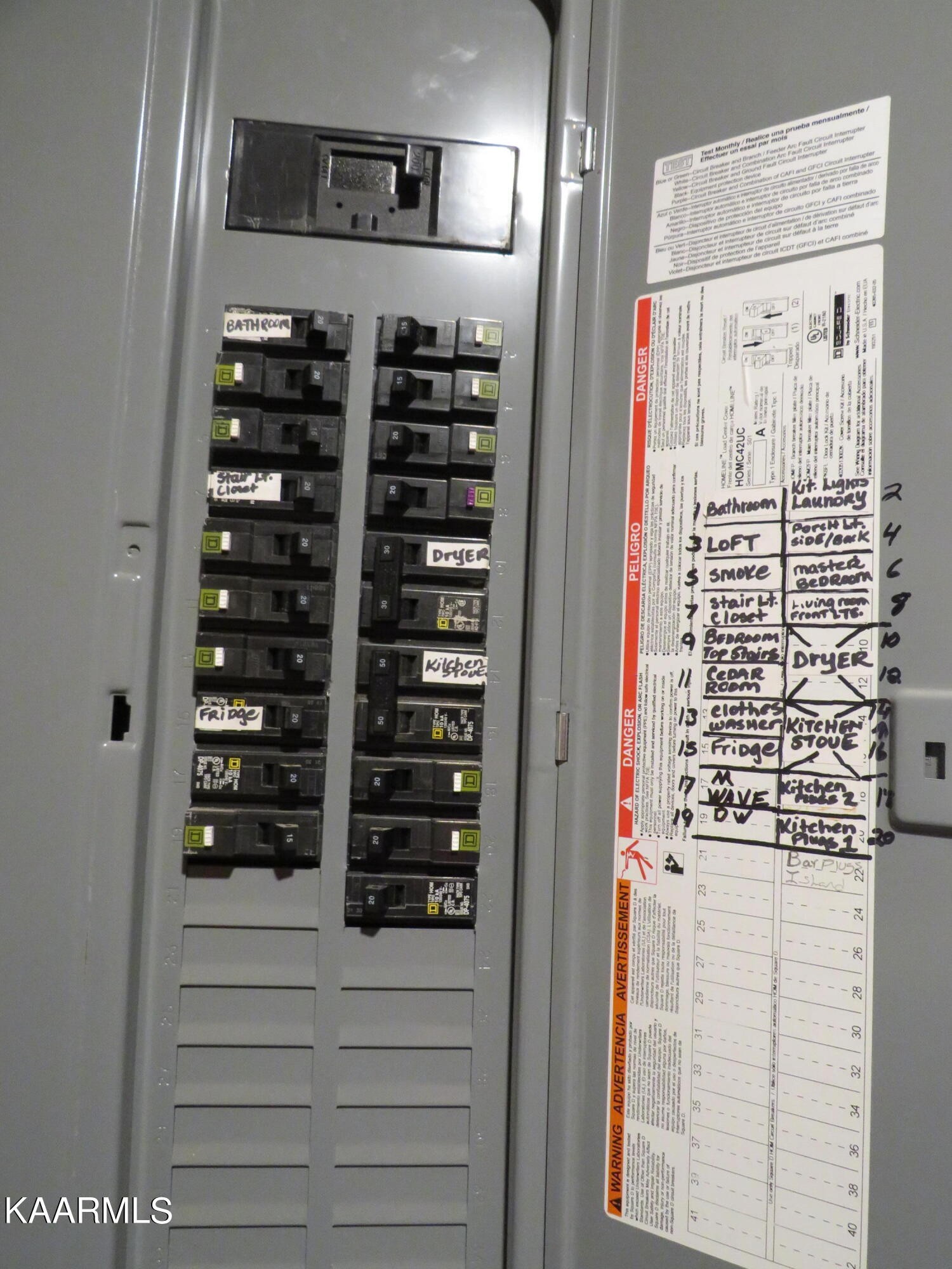 266 Ross Williams Road Lancing, TN 37770 - Photo 34 of 39 a close view of walk in closet and wooden wall