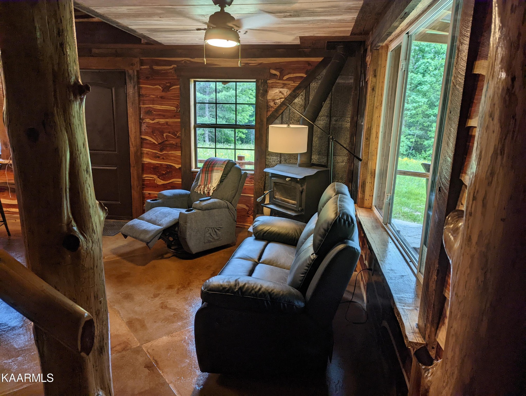 266 Ross Williams Road Lancing, TN 37770 - Photo 5 of 39 a living room with furniture and a large window