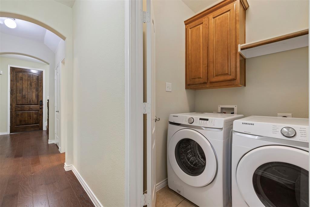 5706 Baltic Boulevard Plano, TX 75024 - Photo 20 of 22 1st level laundry room with full size washer & dryer