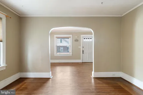 a view of a livingroom with wooden floor