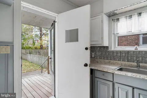 a view of a pathway of a wrought fence