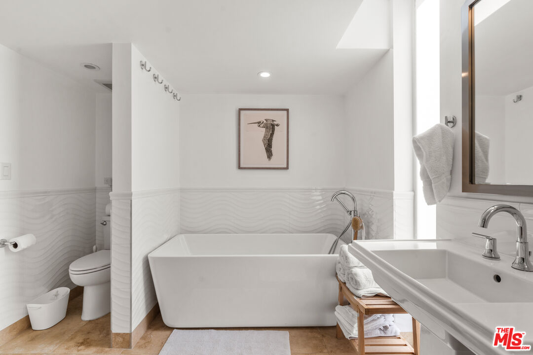 3503 Esplanade Marina del Rey, CA 90292 - Photo 15 of 25 a white bath tub sitting next to a white toilet