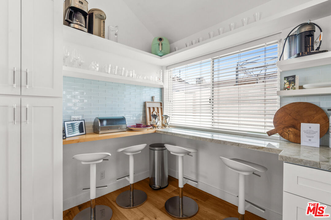 3503 Esplanade Marina del Rey, CA 90292 - Photo 4 of 25 a kitchen with stainless steel appliances granite countertop a sink and cabinets