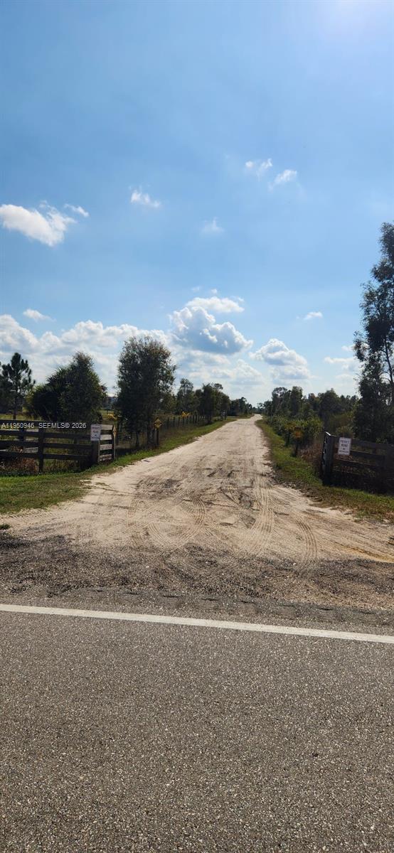 48345 Bermont Road Punta Gorda, FL 33982 - Photo 2 of 18 a view of an lake and a mountain
