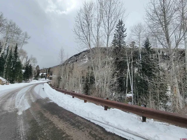 a dining area with chairs and table