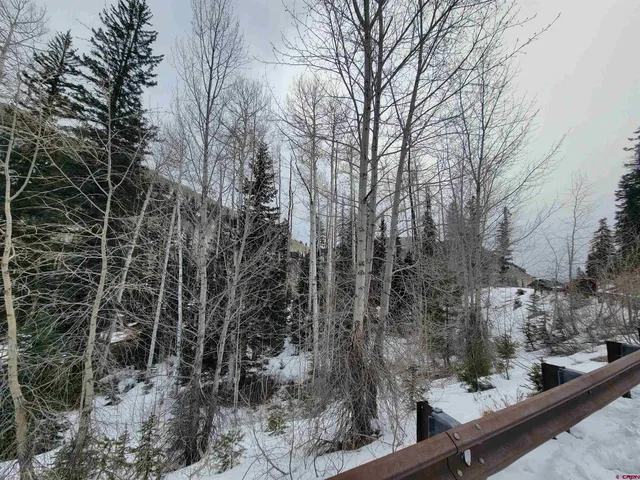 a view of a swimming pool with a lounge chairs