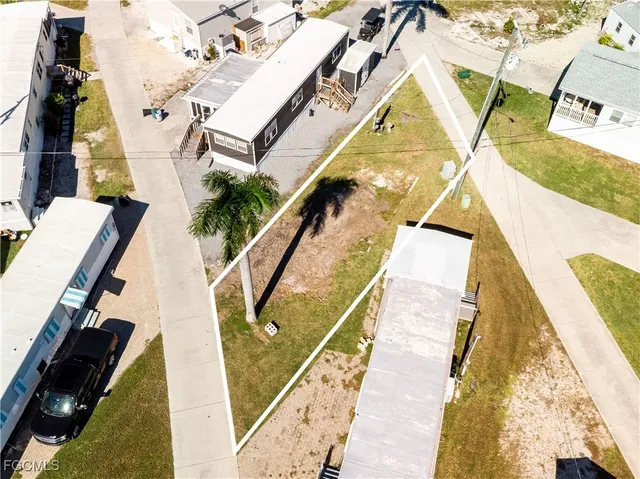 a view of swimming pool with seating area