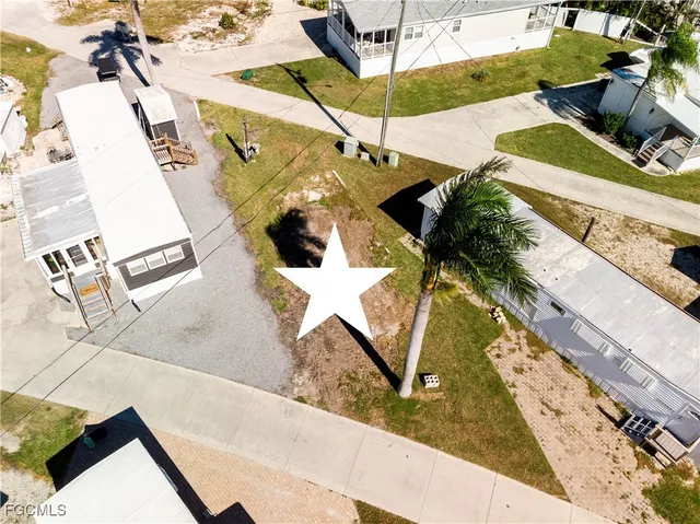 a view of a lake with a white house