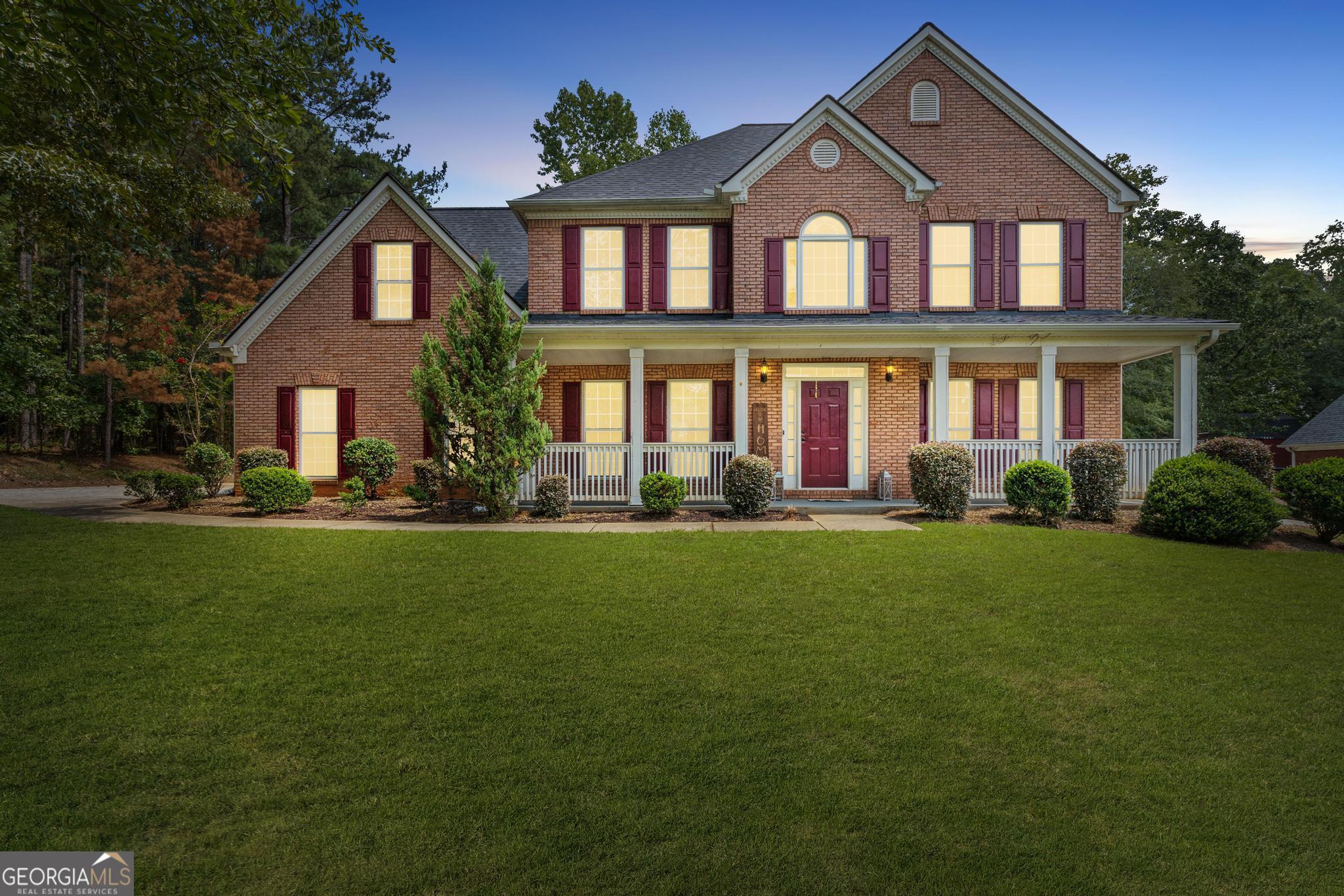 465 St Andrews Drive Jackson, GA 30233 - Photo 1 of 1 a front view of a house with a yard