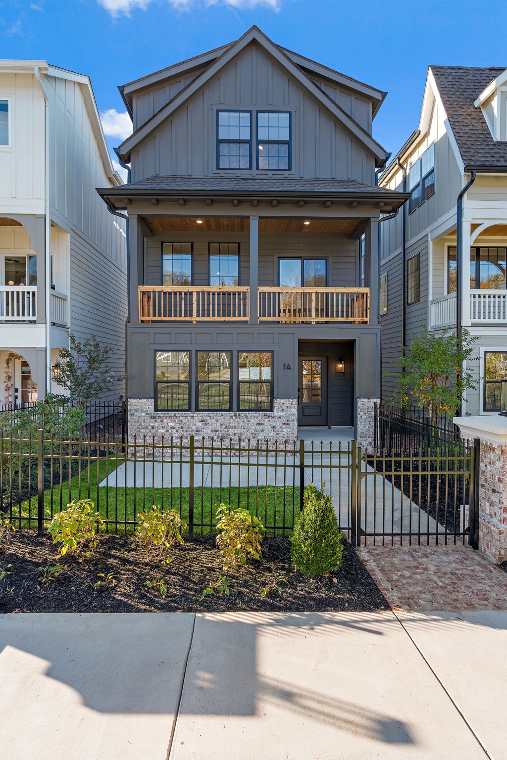 504 Edwin Street Nashville, TN 37207 - Photo 2 of 49 a front view of a house with a garden
