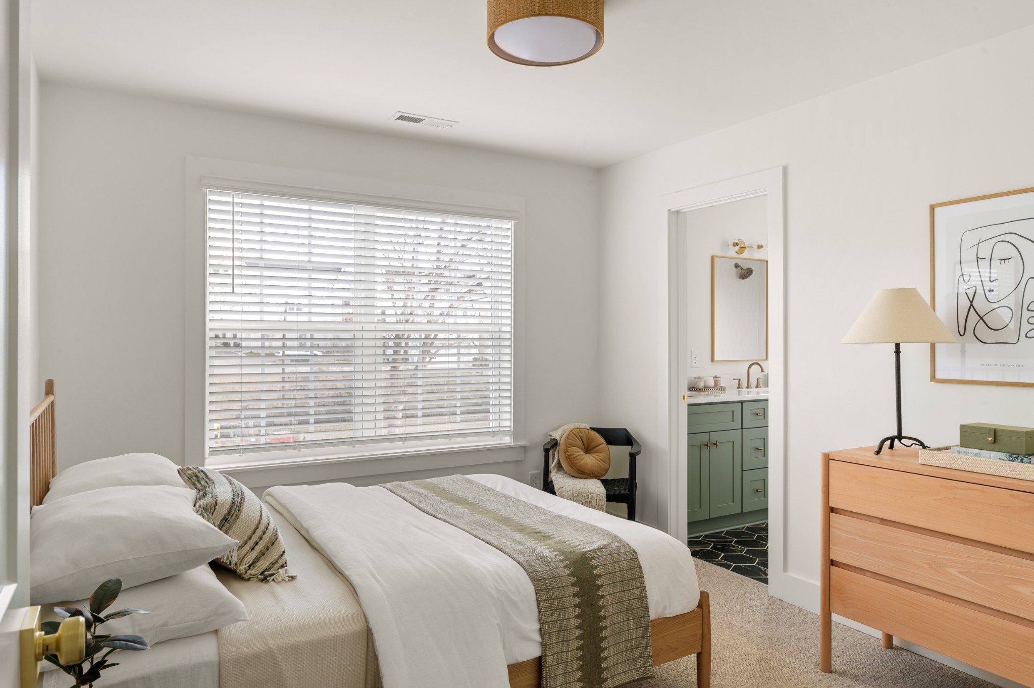 504 Edwin Street Nashville, TN 37207 - Photo 31 of 49 a bedroom with a bed and a window