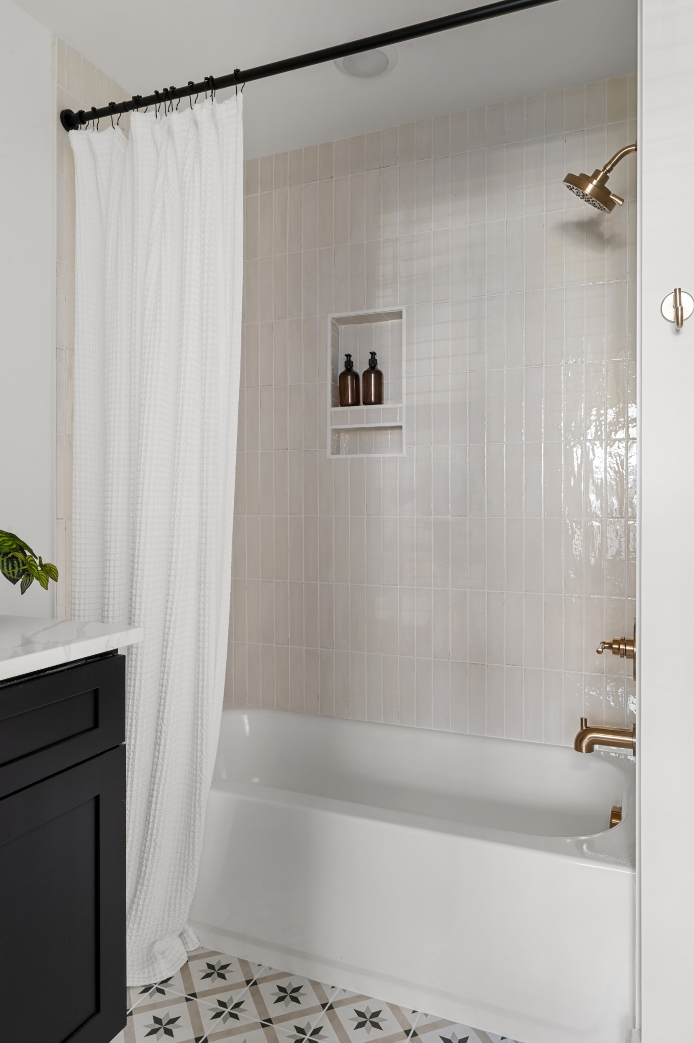 504 Edwin Street Nashville, TN 37207 - Photo 40 of 49 a bathroom with a bathtub and a shower