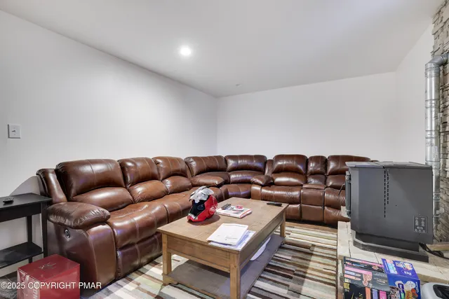 a utility room with dryer washer and a window