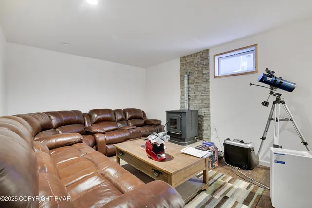 a room with furniture and wooden floor