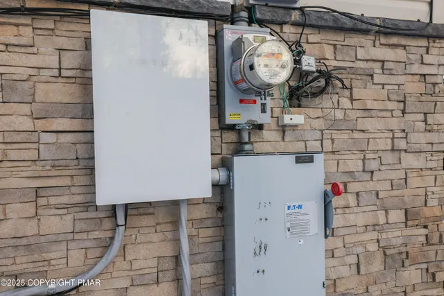a bathroom with a shower and a sink