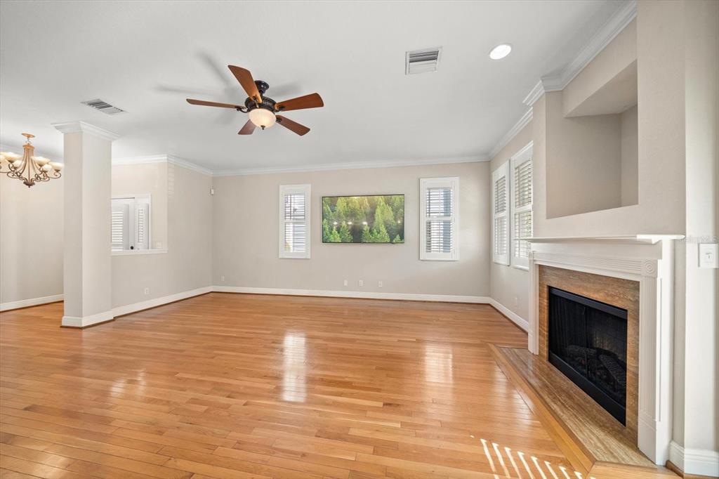 270 2nd Avenue Southwest Largo, FL 33770 - Photo 11 of 67 an empty room with windows and fireplace