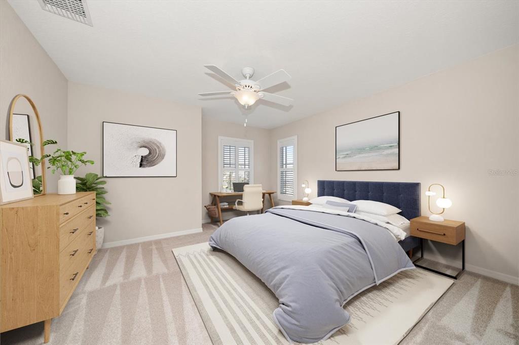 270 2nd Avenue Southwest Largo, FL 33770 - Photo 42 of 67 a spacious bedroom with a bed and a chandelier