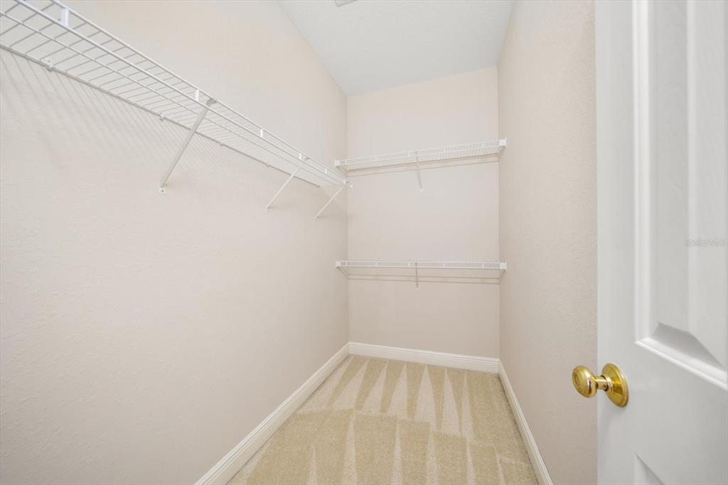 270 2nd Avenue Southwest Largo, FL 33770 - Photo 50 of 67 a view of small space with racks on the wall