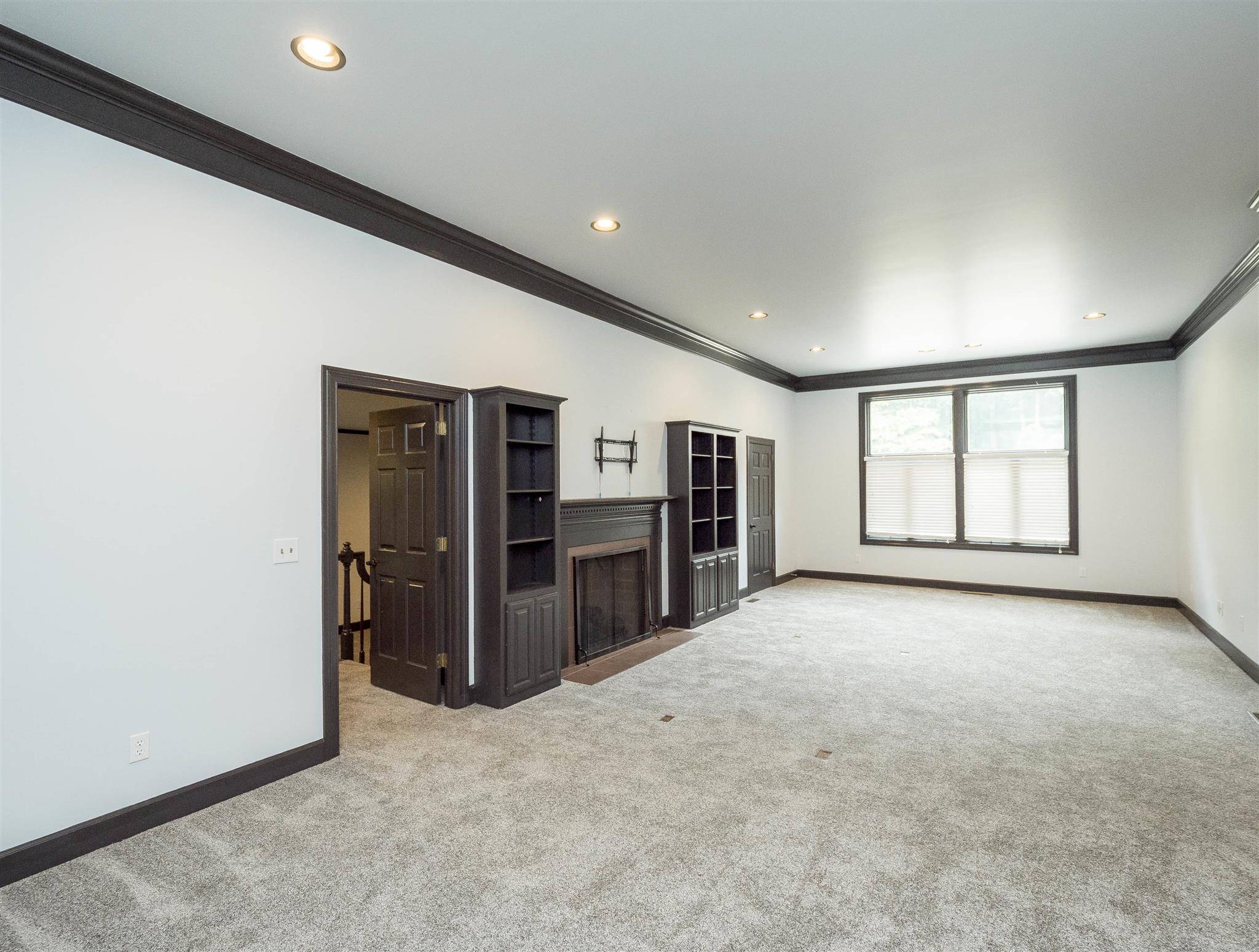 605 Fairway Trail Springfield, TN 37172 - Photo 11 of 30 Family room offers fireplace and built ins!