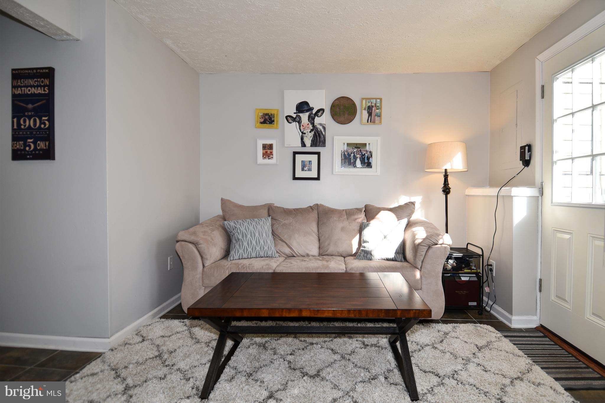 1615 Fieldthorn Drive Reston, VA 20194 - Photo 22 of 28 a bed room with a bed and a lamp