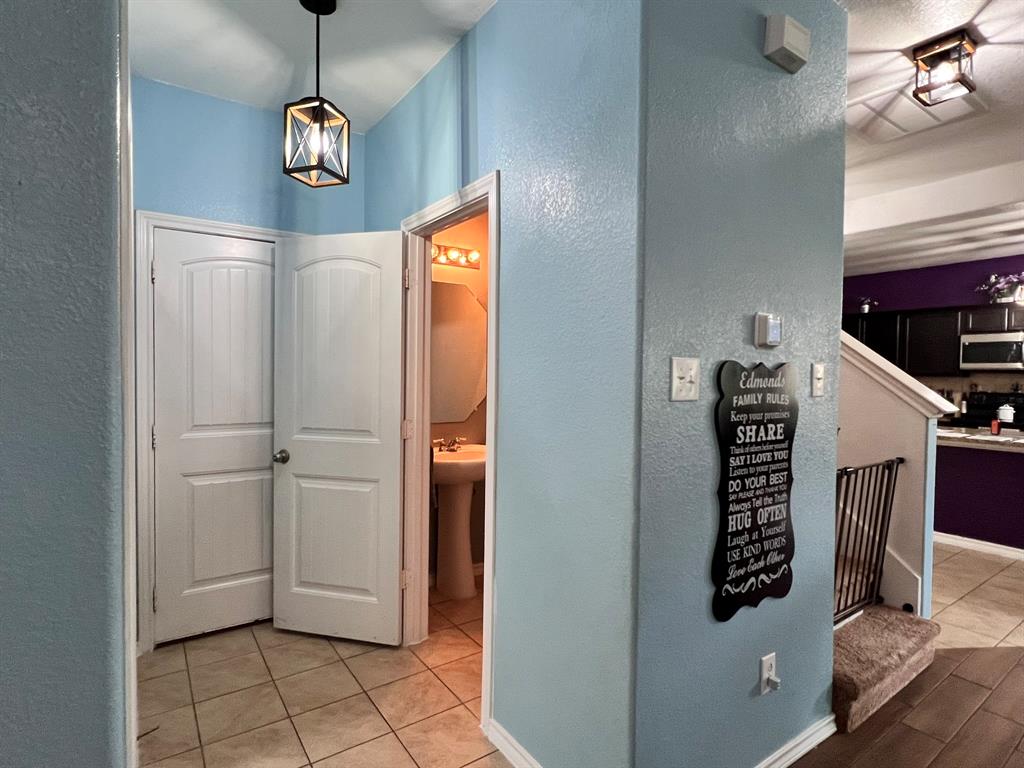 324 Fairgrounds Lane Ponder, TX 76259 - Photo 26 of 40 a view of a hallway with windows