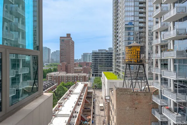 a view of a city with tall buildings