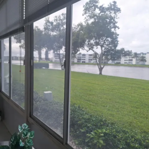 a view of a glass door and porch