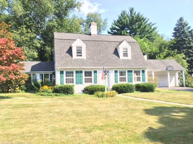 83 Dover Road New Britain, CT 06052 - Photo 1 of 1 a front view of a house with a yard