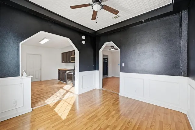 a view of living room with furniture and flat screen tv