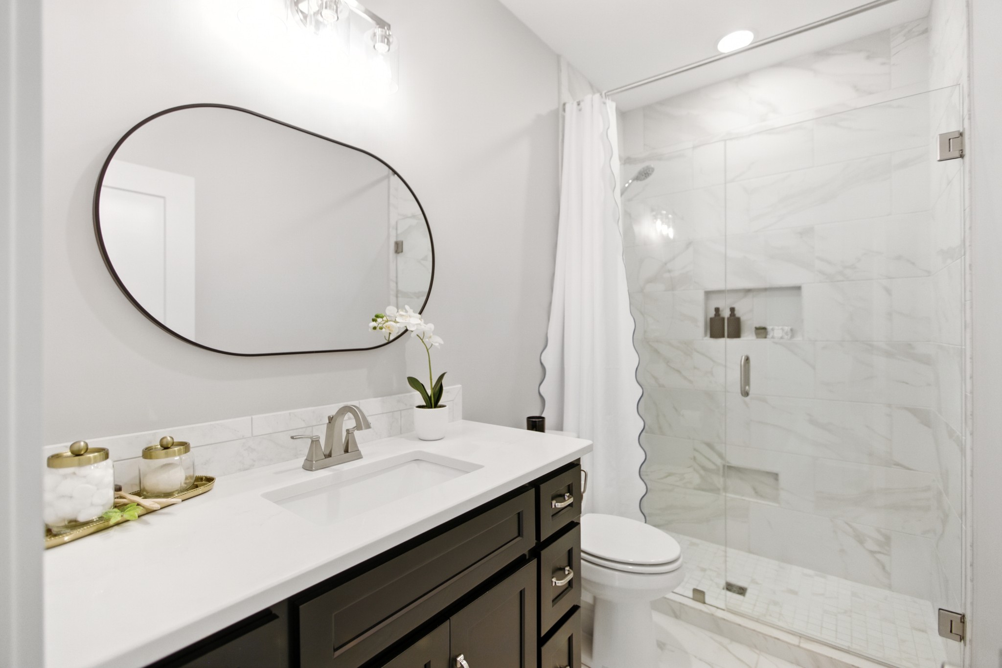 74 Holt Lane Tullahoma, TN 37388 - Photo 51 of 72 a bathroom with a sink a toilet and a mirror